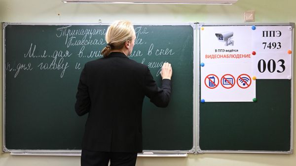 Учитель на уроке
